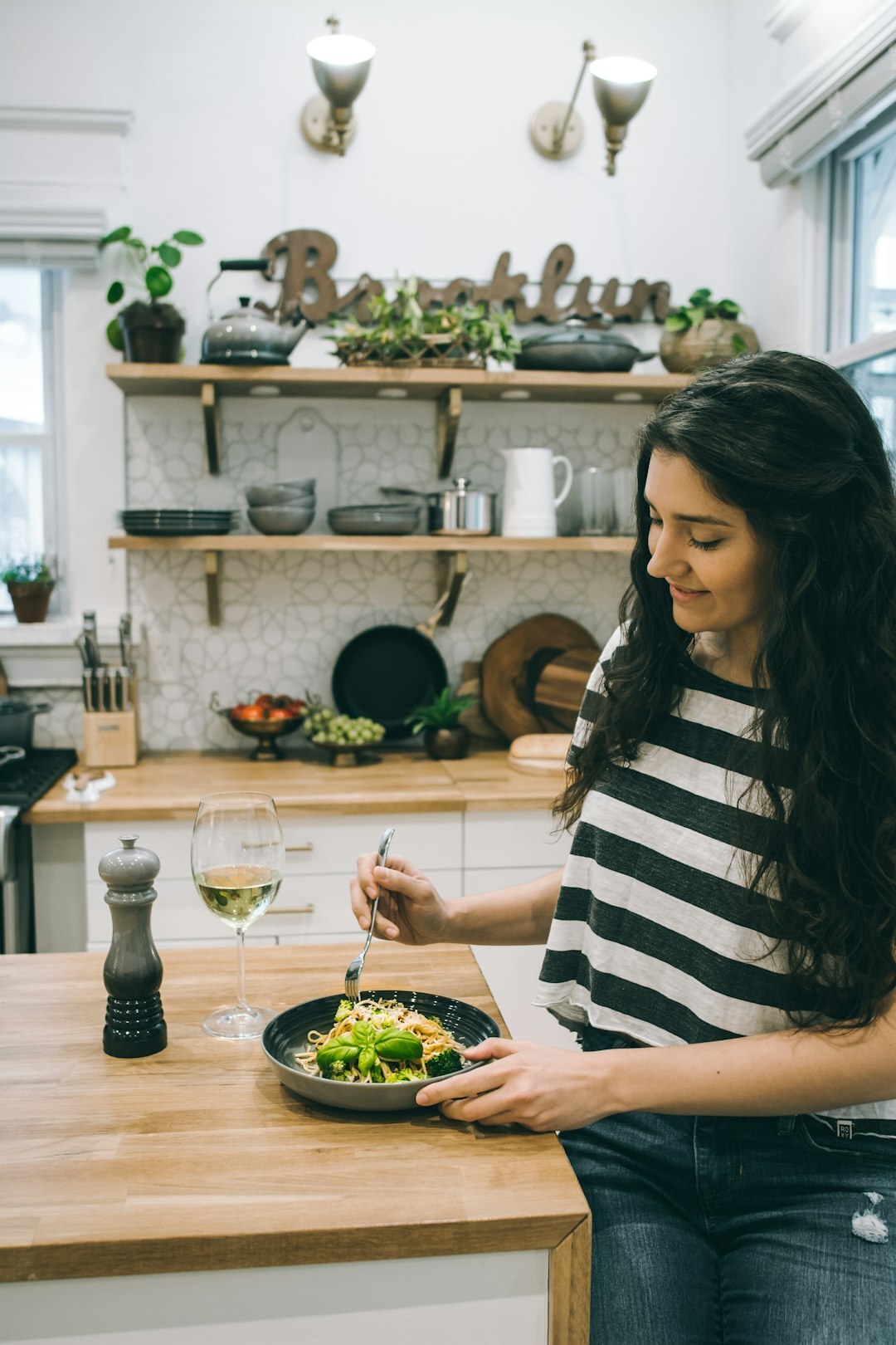 woman chopping fresh herbs