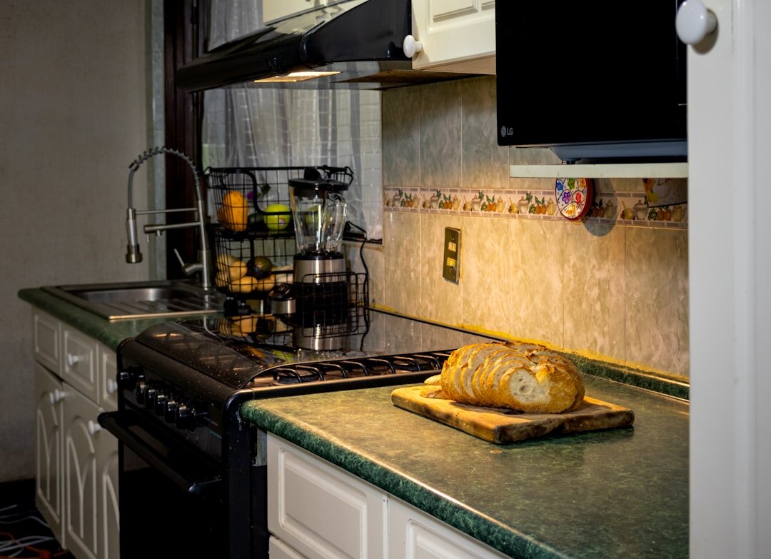 Homemade bread loaf cooling on a kitchen counter